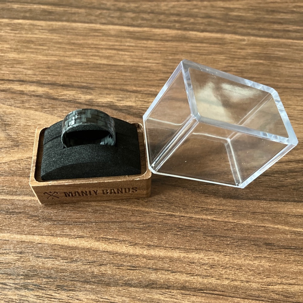 The Spark wedding ring from Manly Bands. Size 9.